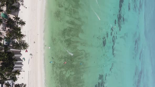 Vertical Video of the Ocean Near the Coast of Zanzibar Tanzania Aerial View