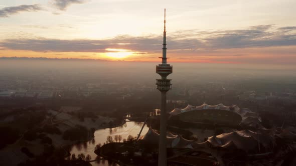 Aerial shot over Olympiaturm tower in Munich Germany