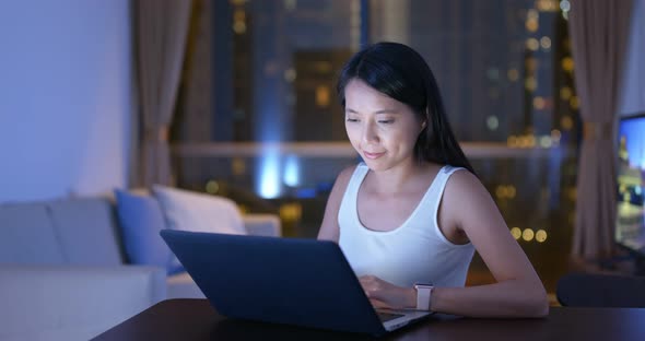 Woman work on laptop computer at home