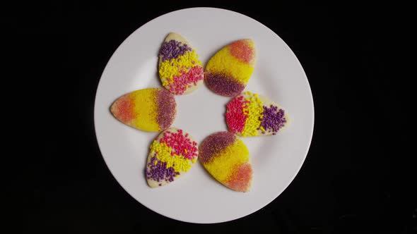 Cinematic, Rotating Shot of Easter Cookies on a Plate 