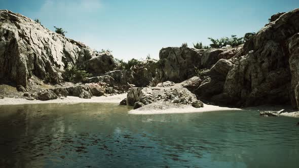 Coastal View of a Sand Beach with Cliffs