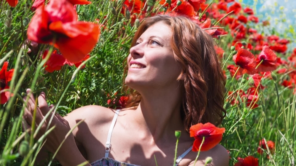 Woman In Poppy Field