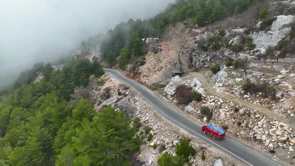 Foggy road in the mountains aerial view 4 K