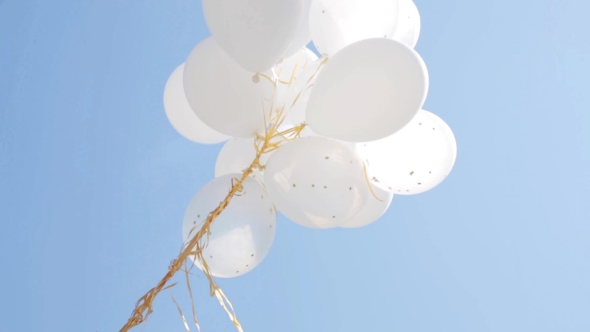 Inflated White Helium Balloons In Blue Sky 2