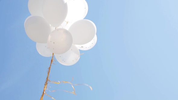 Inflated White Helium Balloons In Blue Sky 1