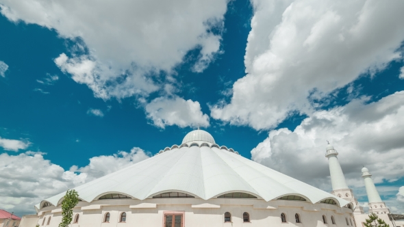White Clouds On a White Arab Mosque. Kazakhstan -  