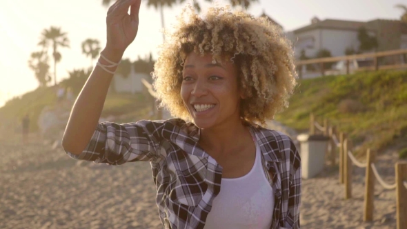 Young Woman Gives Air Kiss.