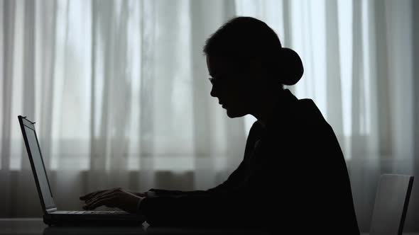 Nervous Woman Closing Laptop