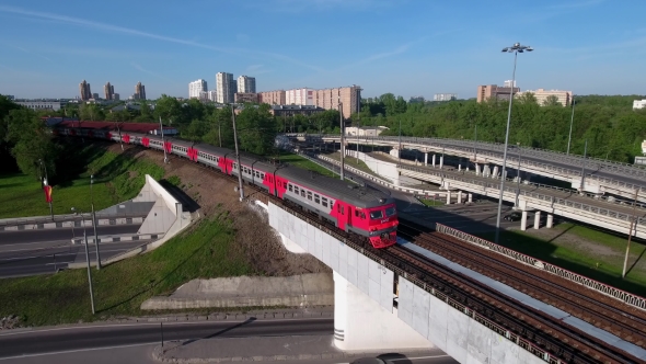 Moving Suburban Electric Train On The Bridge Near The Junction