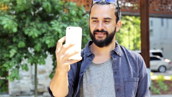 Man Taking Smartphone Video Or Selfie In City 42