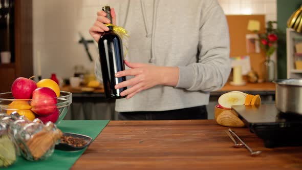 Woman Preparing Ingredients for Mulled Wine