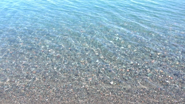 Pebble Bottom Under Clear Shallow Water