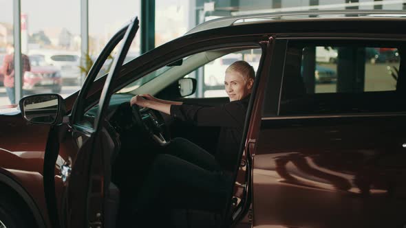 Business Woman Buying the Car