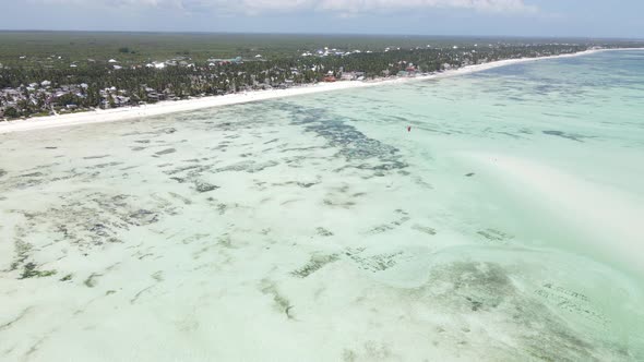 Aerial View of Low Tide in the Ocean Near the Coast of Zanzibar Tanzania Slow Motion