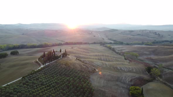 Val d'Orcia Rolling Hills and Farmhouse in Countryside Tuscany Aerial View