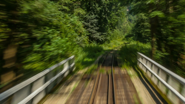 Train Moving Along Railroads In Deep Mountains 2