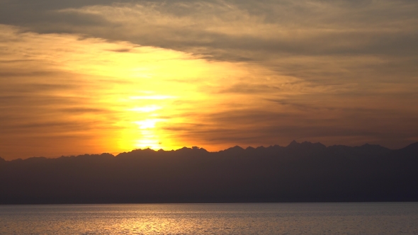 Beautiful Sunset Over Issyk Kul Lake In Kyrgyzstan And Distant Ridge Line 
