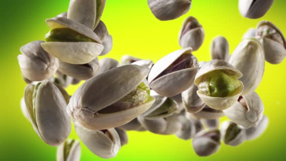 Flying of Pistachios in Lime Green Background