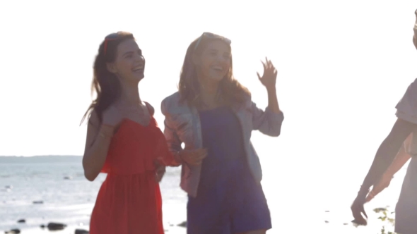 Group Of Smiling Women Or Girls Dancing On Beach 12