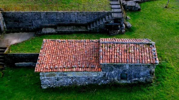 Aerial View Of Old Traditional Clay Roofing Tiles On Abandoned Buildings Tordoia Coruna, Spain. Doll