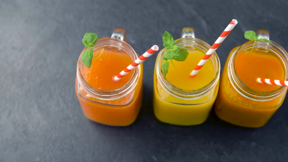 Juices in Mason Jar Glasses with Paper Straws 24