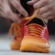 The Athlete Tying Shoelaces On Sneakers. Preparation For The Exercise. . - VideoHive Item for Sale