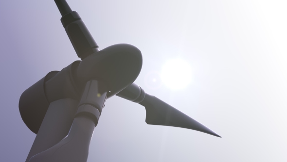 Single Rotating Wind Turbine Against Sunny Sky And Blazing Sun   Shot