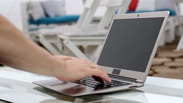 Man Working On Laptop 