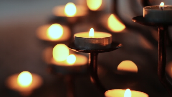 Candle Flame at Night in Church alt
