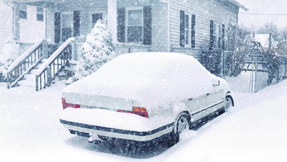 Car By House In Snowstorm alt