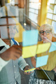 Two creative millenial small business owners working on social media strategy brainstorming - PhotoDune Item for Sale