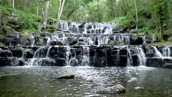 Beautiful waterfall in tropical forest at Namtok Samlan National Park - Slow Motion