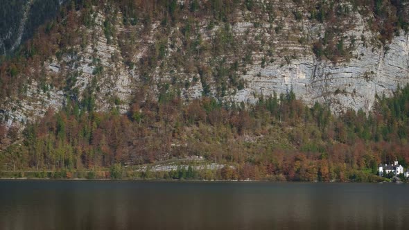 Famous Tourist Destination Serene Town Hallstatt in Mountains Alps in Autumn. Cathedral Church