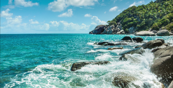 Sea Waves Breaking On The Rocks