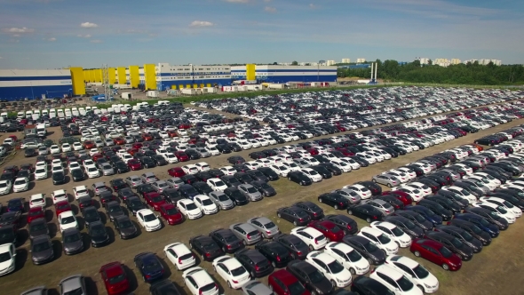 Aerial View Of Storage Parking With New Unsold Cars