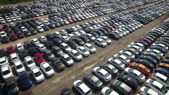 Aerial View Of Storage Parking With New Unsold Cars