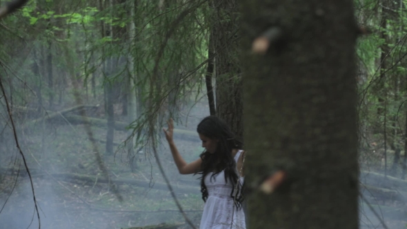 Girl In A Mysterious Foggy Forest