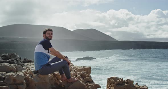 Young Man in the Middle of Amazing Landscape with