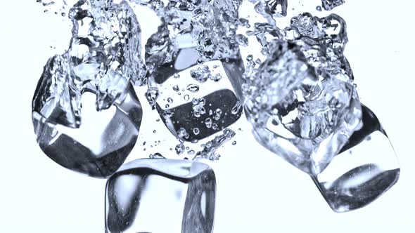 Super Slow Motion Shot of Ice Cubes Falling Into Water at 1000Fps