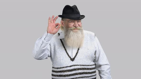 Old Happy Retired Man Shows Okay Gesture