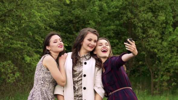 Pretty Girls Taking Selfie in Green Garden