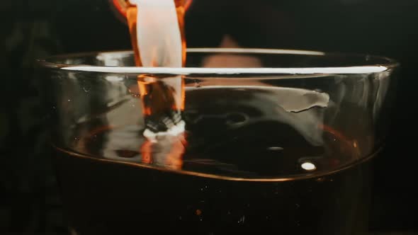 Pouring Beverage. Close-up.