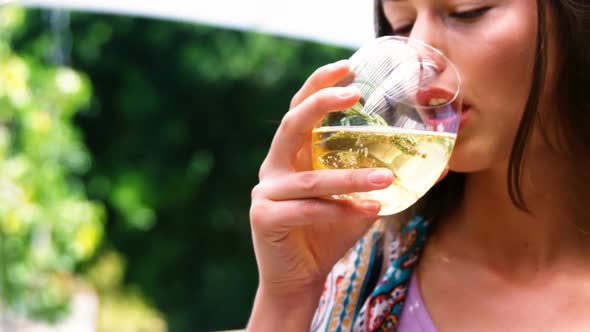 Girl drinking a cup of green tea