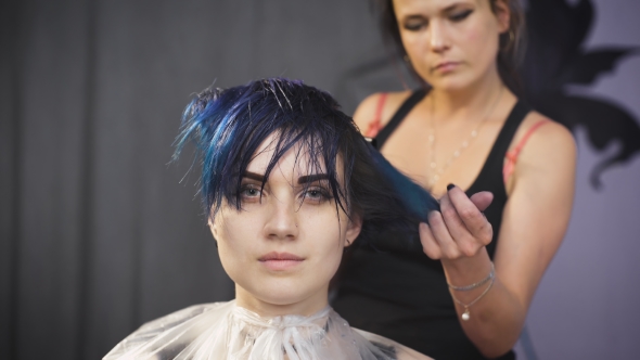 The Girl With Blue Hair in a Beauty Salon