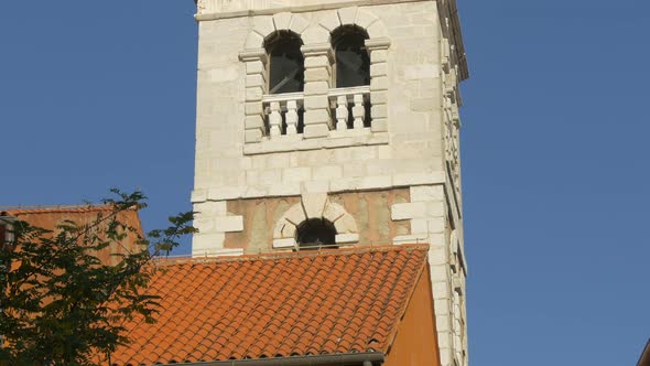 Tilt up of a church bell tower
