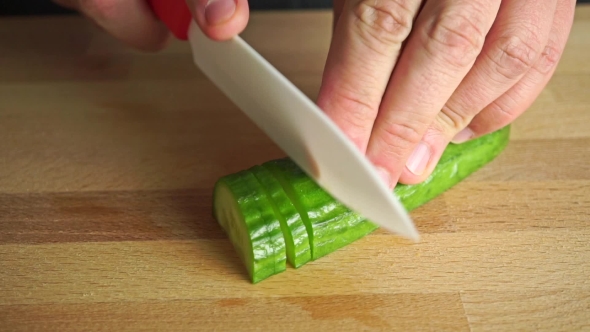 Amateur Cooker Cutting Fresh Cucumber