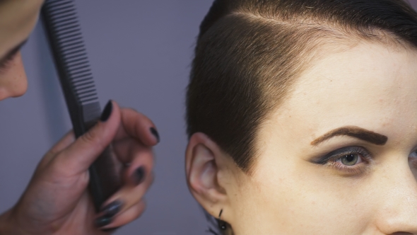 Business Woman Making a Stylish Haircut. Professional Hairdresser