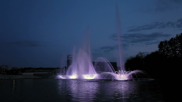 Bright Fountain On The Water Pond Or River