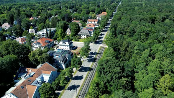 drone aerial view suburbs munich. luxury upper middle class housing in outskirts of bavarian capital