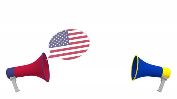 Speech Bubbles with Flags of the EU and the USA and Loudspeakers